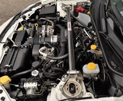 Cusco | Front strut brace - carbon look with BrakeStopper | GT/GR 86 &amp; BRZ I &amp; II